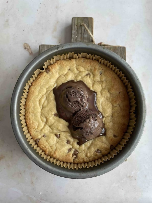 Cookie Dough with chocolate ice cream on top in tin