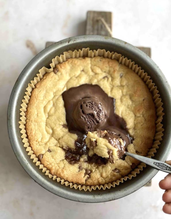 Cookie Dough with someone eating a little with a small spoon