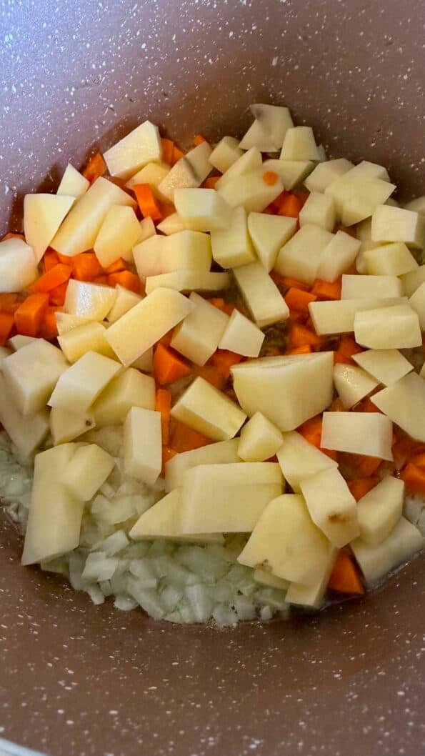 Potatoes and Carrots added to pot