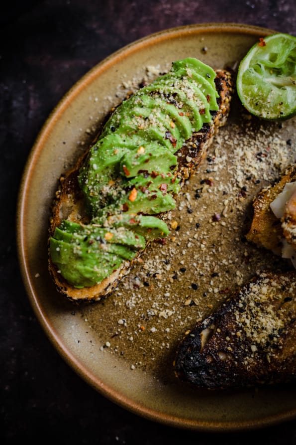 Avocado toast with dukkah on a plate