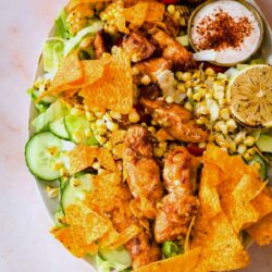 Cajun Chicken salad with nachos on a plate