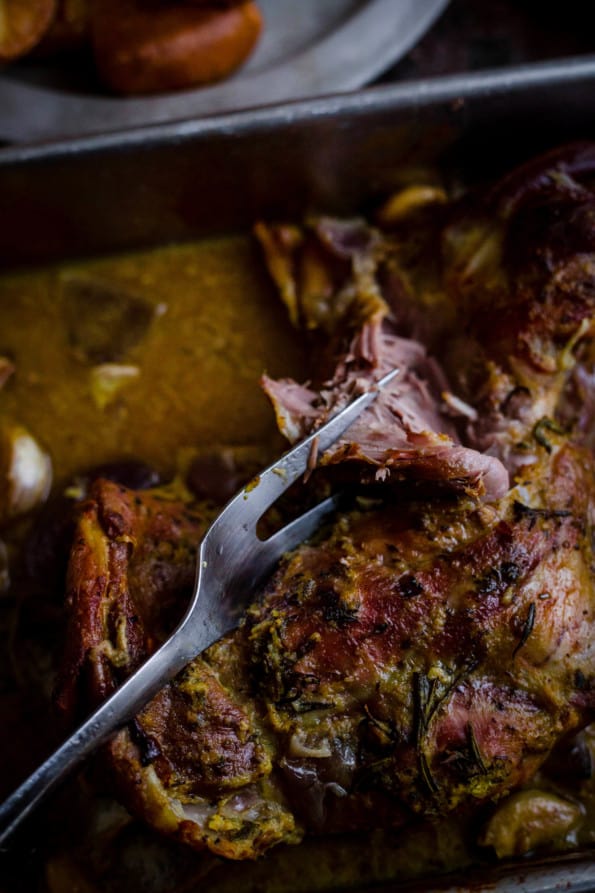 Slow Cooked Lamb Shoulder being shredded with a fork