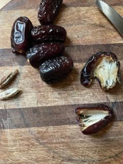 Dates on a chopping board