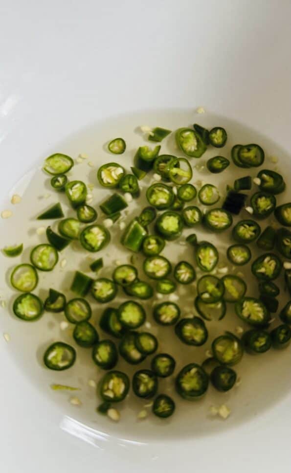 Indo Chinese Chicken, Corn, Egg Drop Soup Chilli Vinegar in bowl