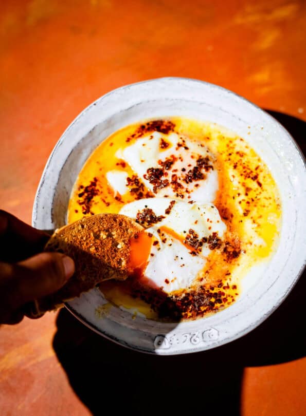 Cilbir in bowl with toast 