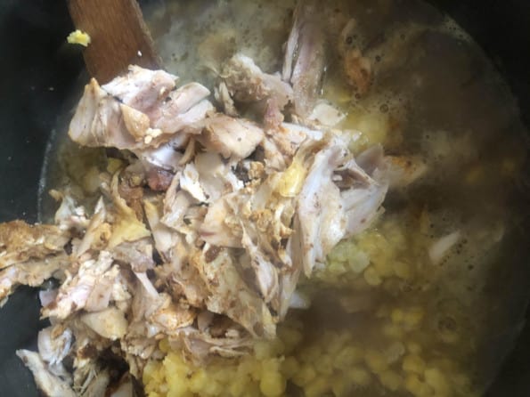 Chicken and corn added to pot
