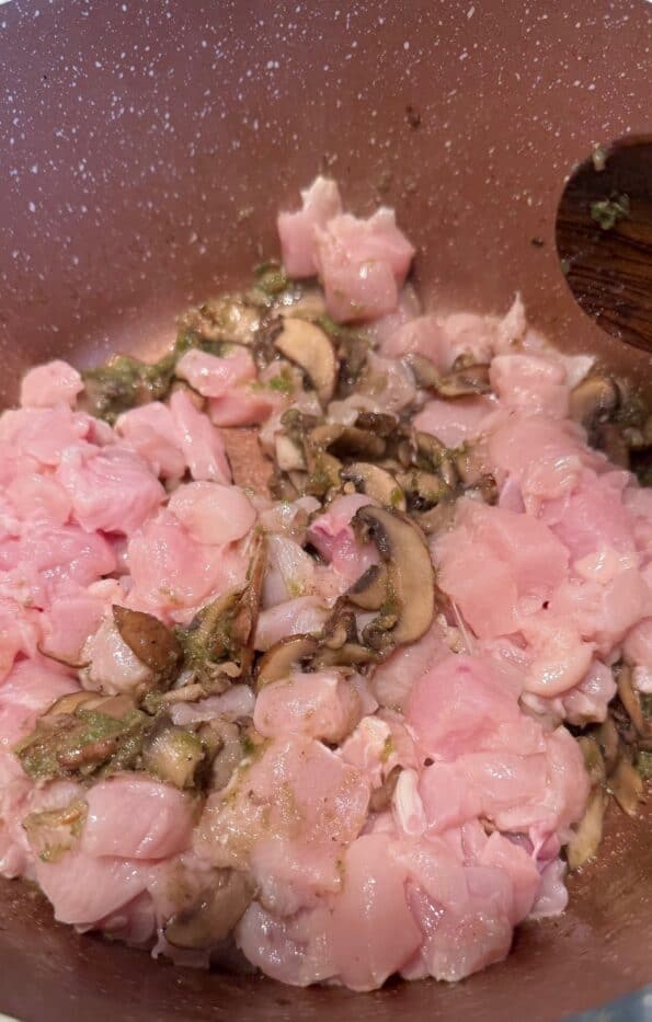 Creamy Mushroom, Chicken, Corn and Orzo Soup Chicken added to pot