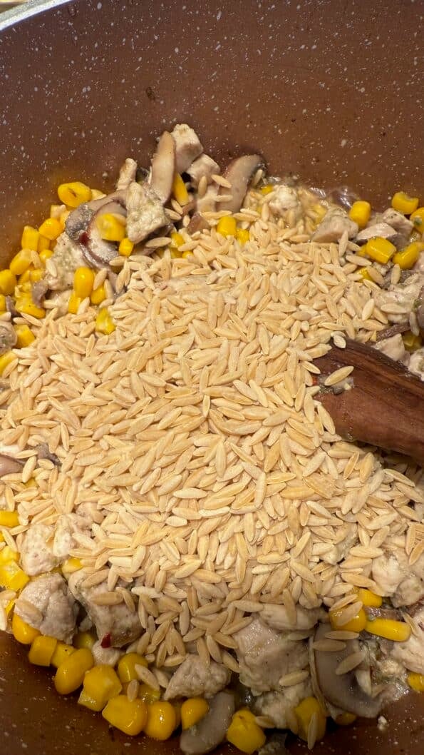 Creamy Mushroom, Chicken, Corn and Orzo Soup Corn and Orzo added to pot