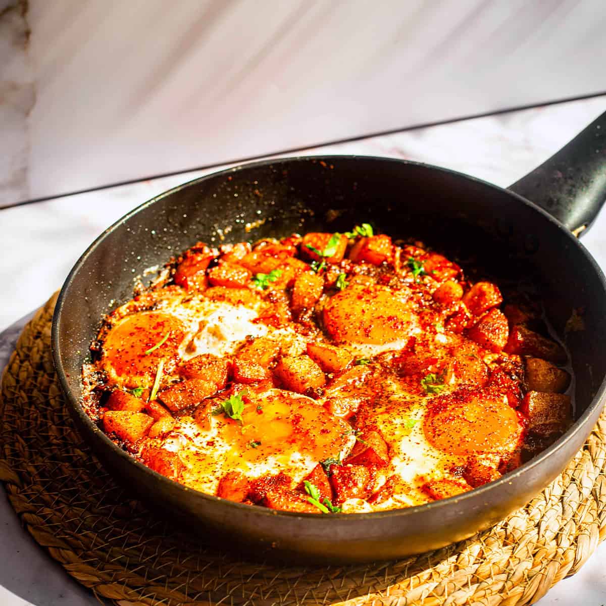 Batata wa bayd in frying pan