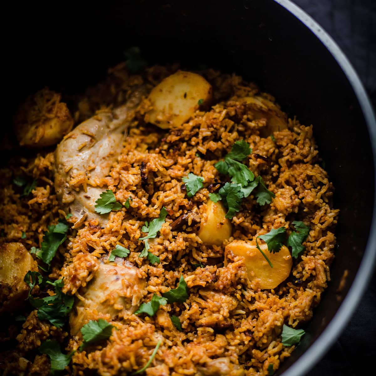 Chicken Akni - The BEST One Pot Chicken and Rice Pilau Akni in pot