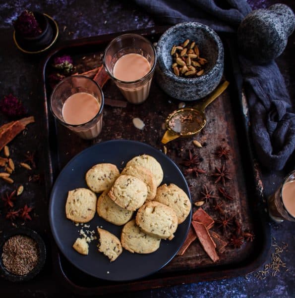 Cumin Biscuits and Masala Chai and spices on a tray