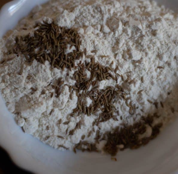 Toasted cumin seeds in flour