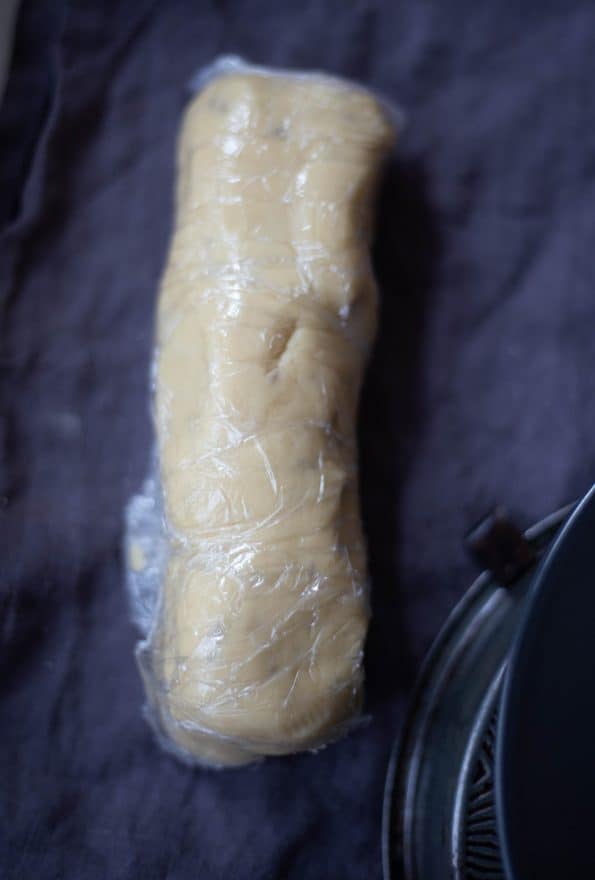 Dough rolled into log wrapped in cling film