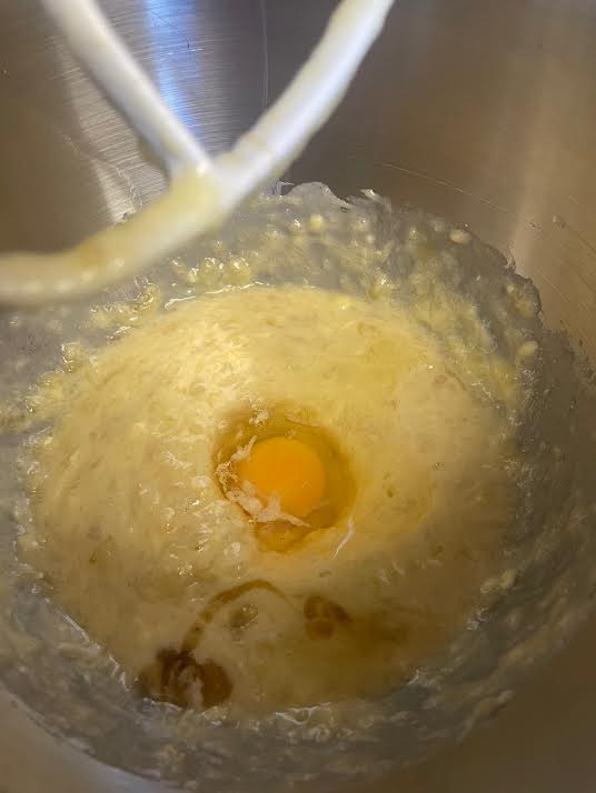 Egg added to batter in bowl