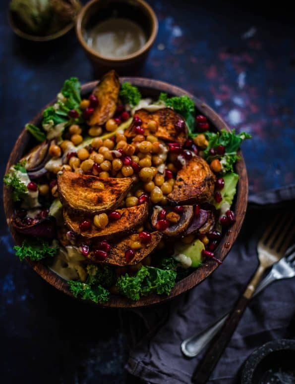 Kale salad with roast chickpeas, sweet potatoes and red onion with tahini dressing 