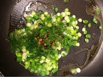 Spring onions, Chilli and dill in pan