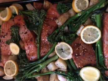 Salmon, Brocolli, Lemons and potatoes in tray