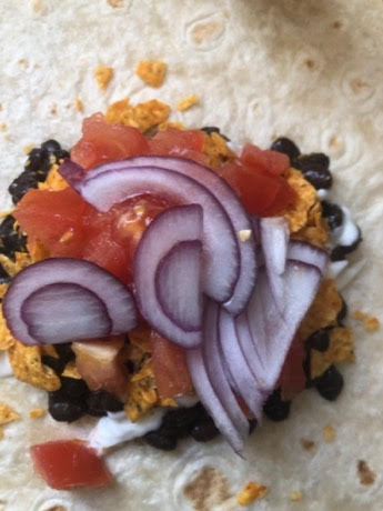 Red Onions added to tortilla 
