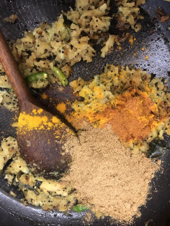 Dry spices added to pan with onions