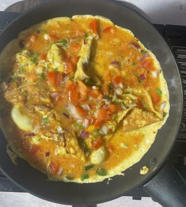 Omelette added to pan
