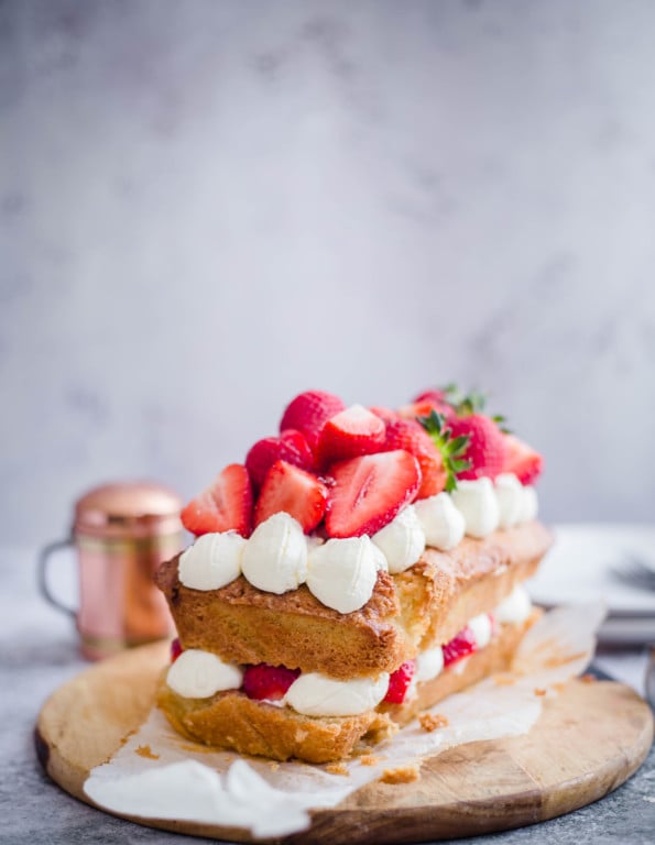 Victoria Sandwich Loaf cake with strawberries and cream for deco