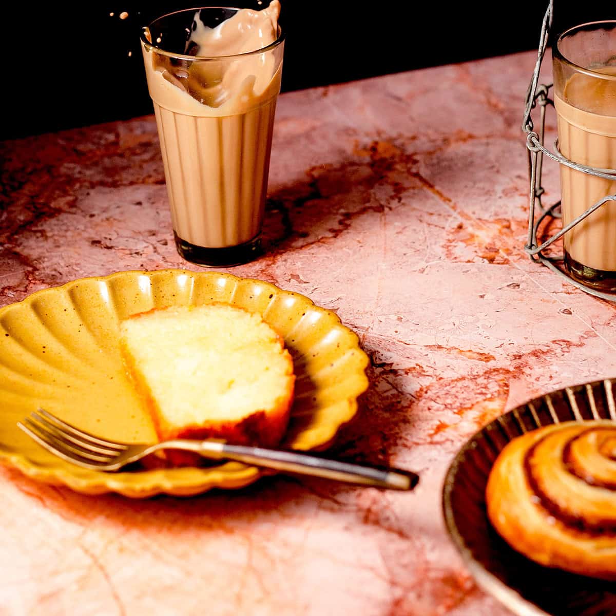 Authentic Indian Chai (Easy Homemade Masala Chai) Chai and sweet treats on table