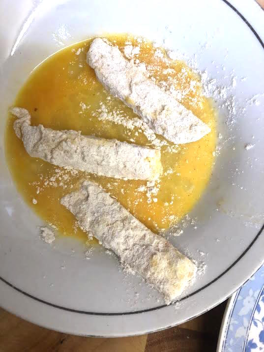 Floured Halloumi fries in egg