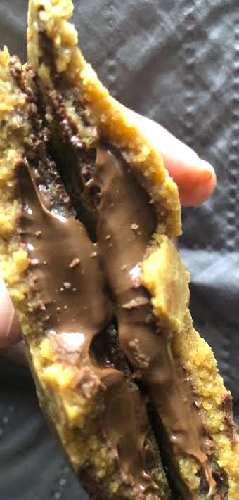 Nutella Cookies split open showing chocolate in middle