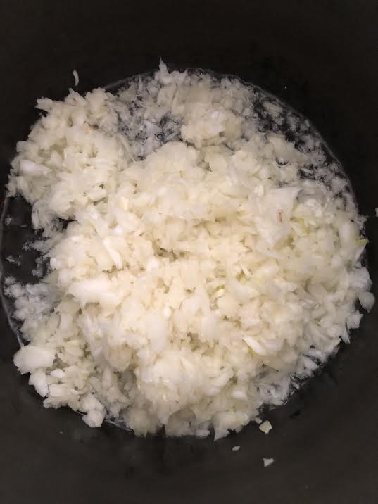 Onions in pot with oil