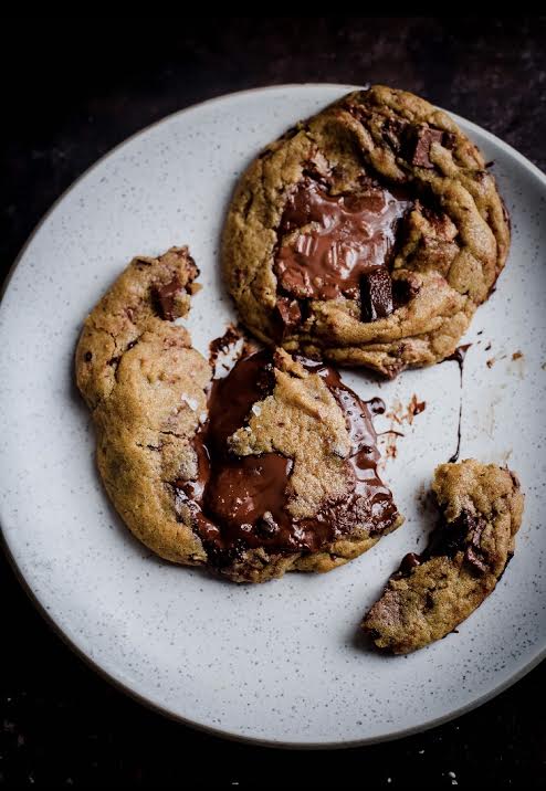 2 Nutella Cookies on plate, one open to show inside