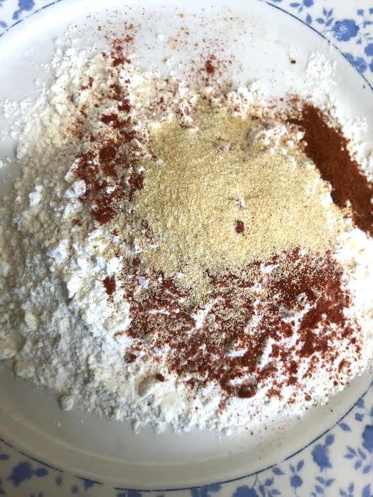 Flour with spices on plate