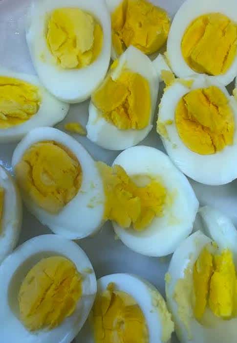 Boiled eggs, chopped in half on a plate