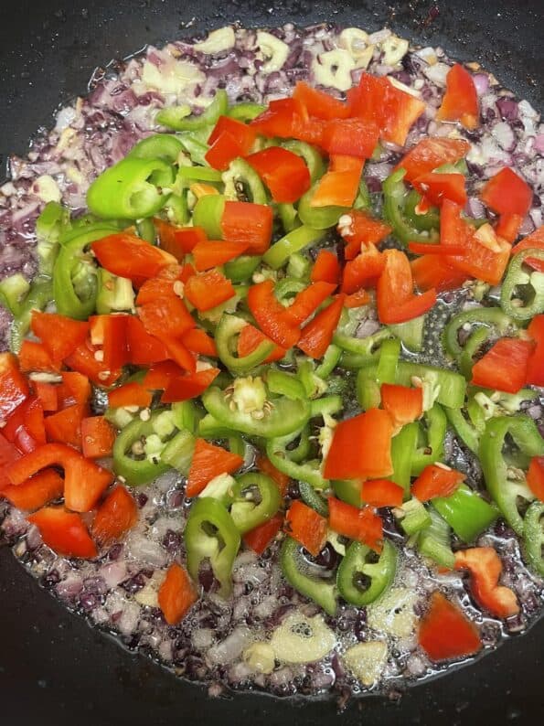 Onion, Green and Red Peppers in pan