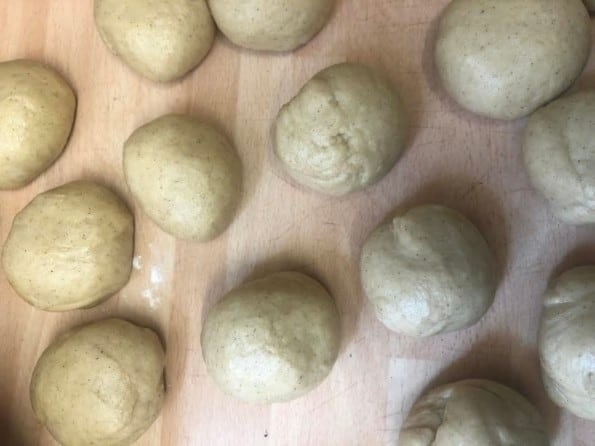Dough balls on floured work surface