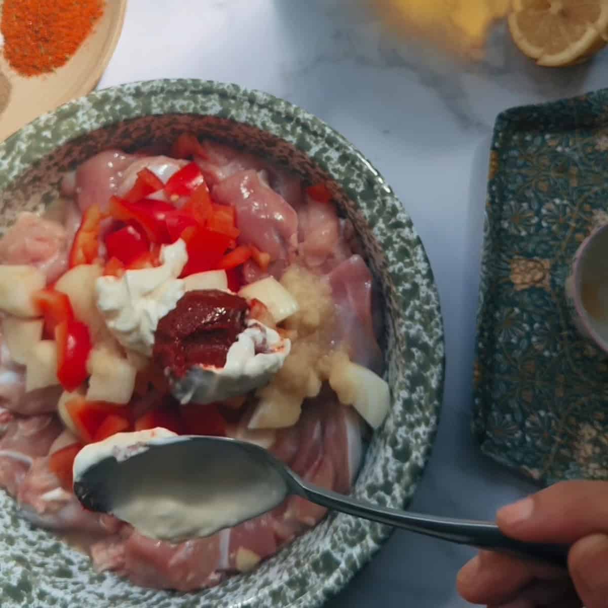 Tavuk Sis - Turkish Chicken Shish Kebab Chicken, yoghurt and pepper paste in bowl