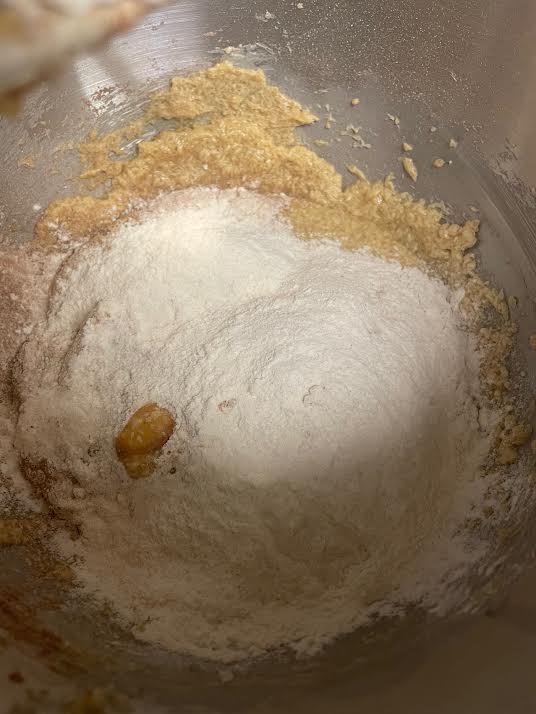 Flour added to bowl of batter