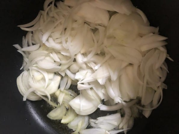 Sliced Onions in pot