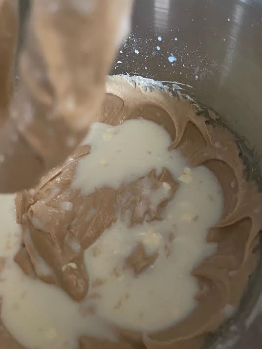 Buttermilk added to batter in bowl