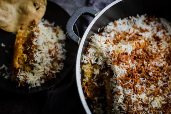 Keema Rice in pot with portion in bowl to side