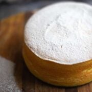 Cotton Cheesecake on a board with icing sugar