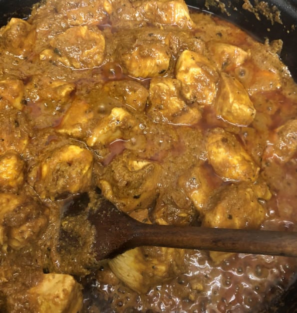 Chicken cooking in pot