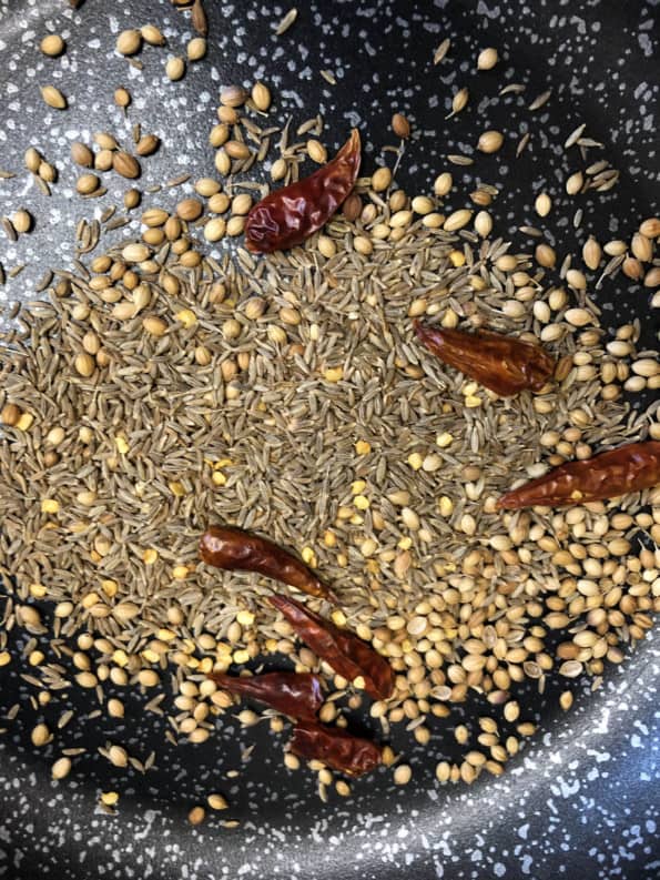 Whole spices roasting in dry pan