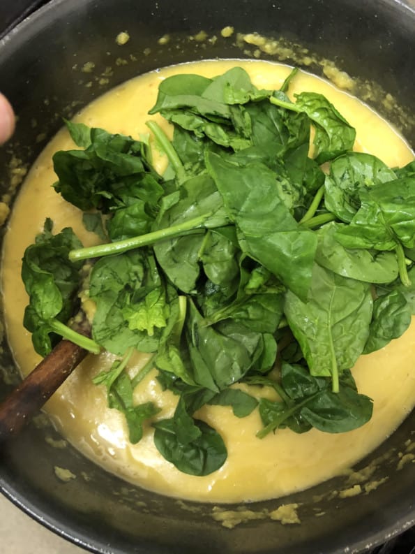 Spinach added to Dal in pot
