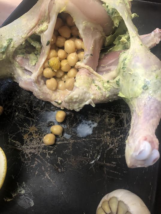 Roast chicken with tarragon butter under skin and chickpeas in cavity 