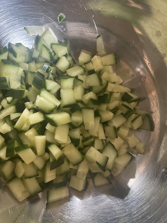 Chopped cucumber in bowl