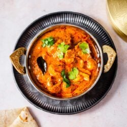 Masala Prawns in a dish with chapatti