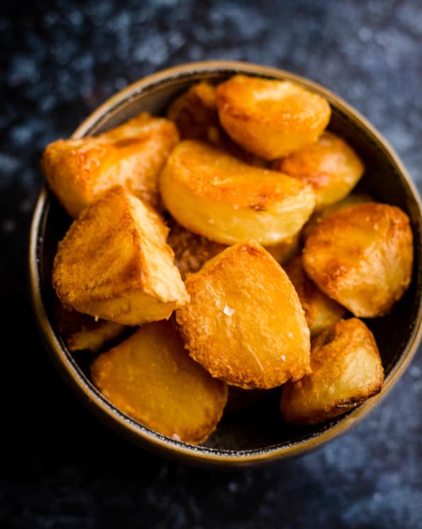 Crunchy roast potatoes in a bowl