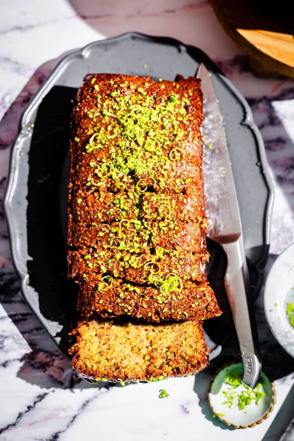 Pistachio loaf cake on a platter