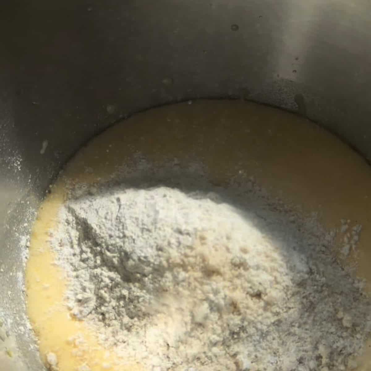 Wet and dry ingredients in bowl