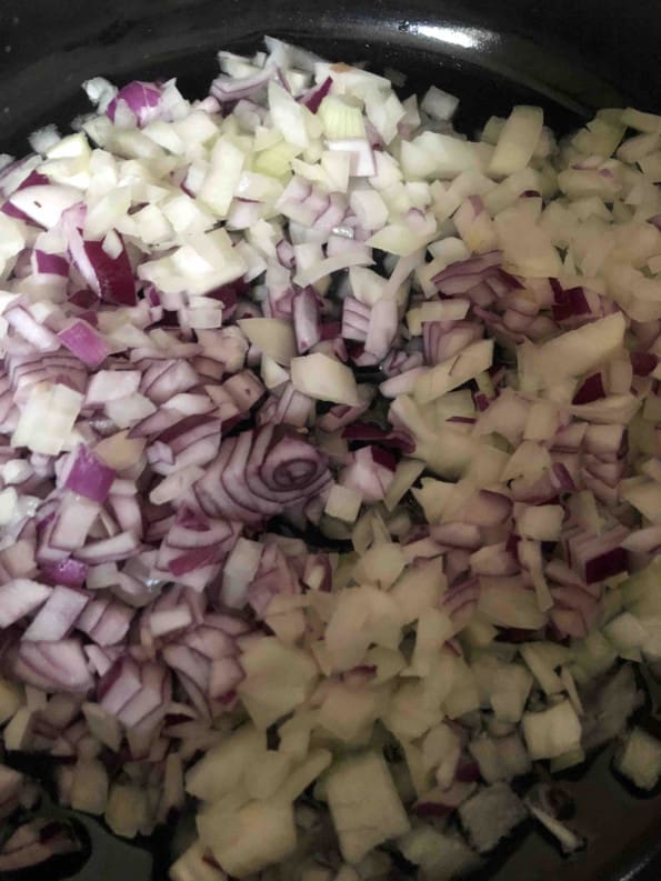Red and white onions in pot